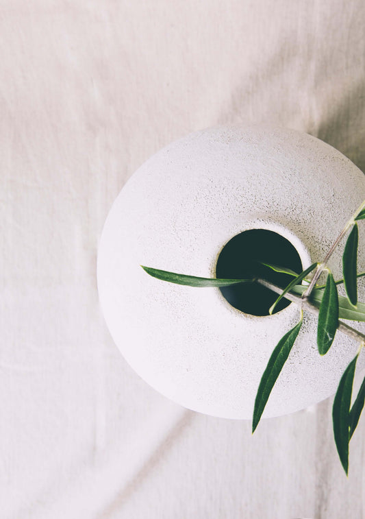 Textured white ceramic vase