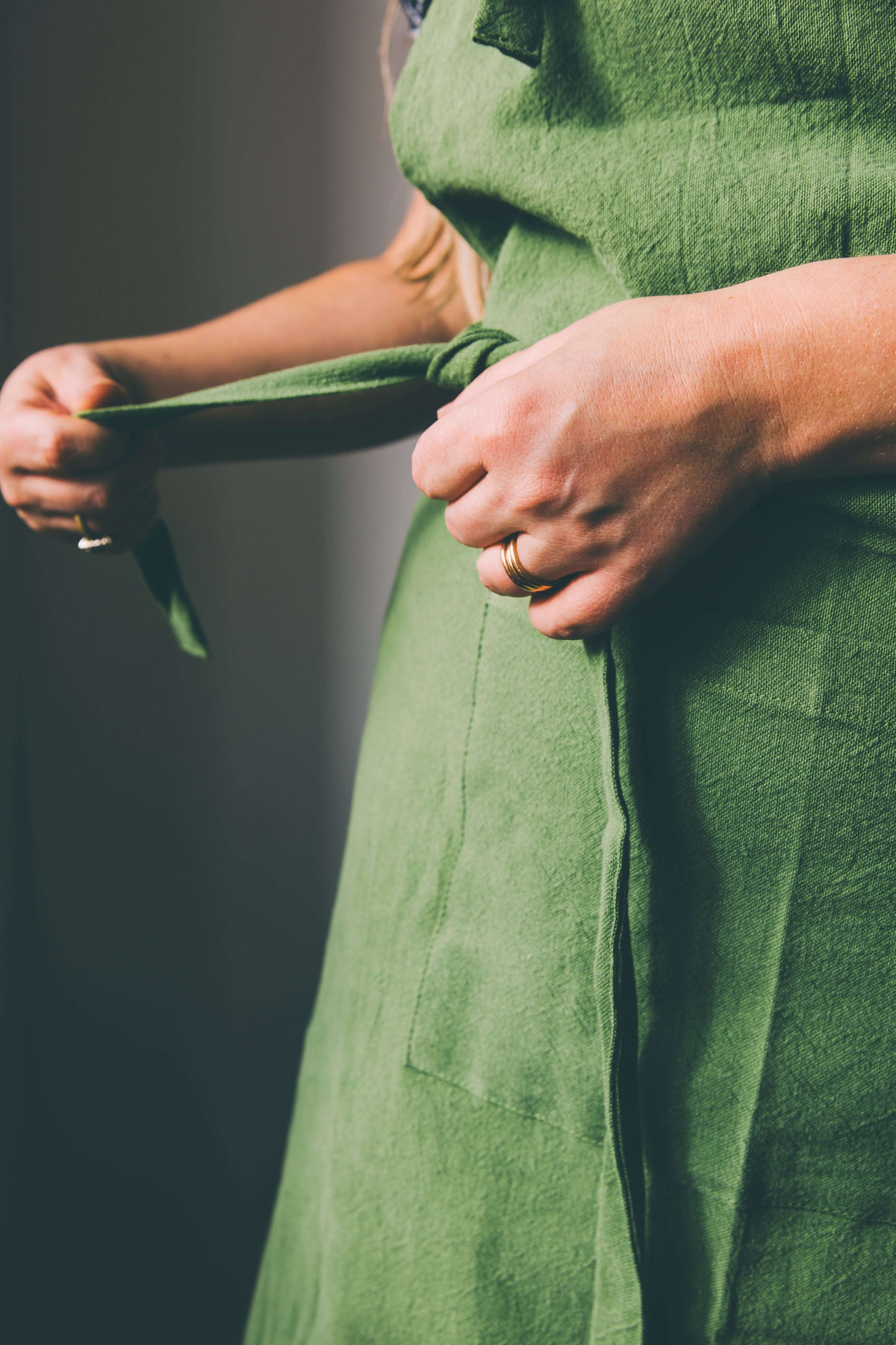 Green linen apron