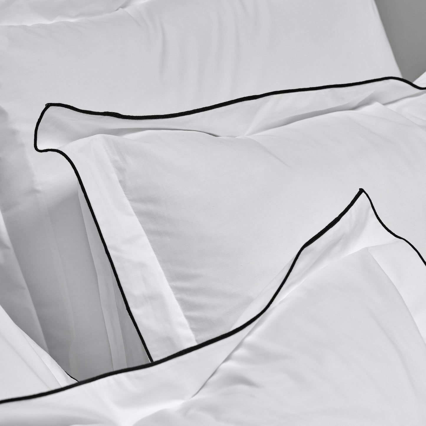 White Coordinated Bedding with Black Trim